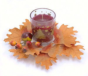 candle-in-an-environment-of-autumn-leaves--imagio-preview7009890.jpg